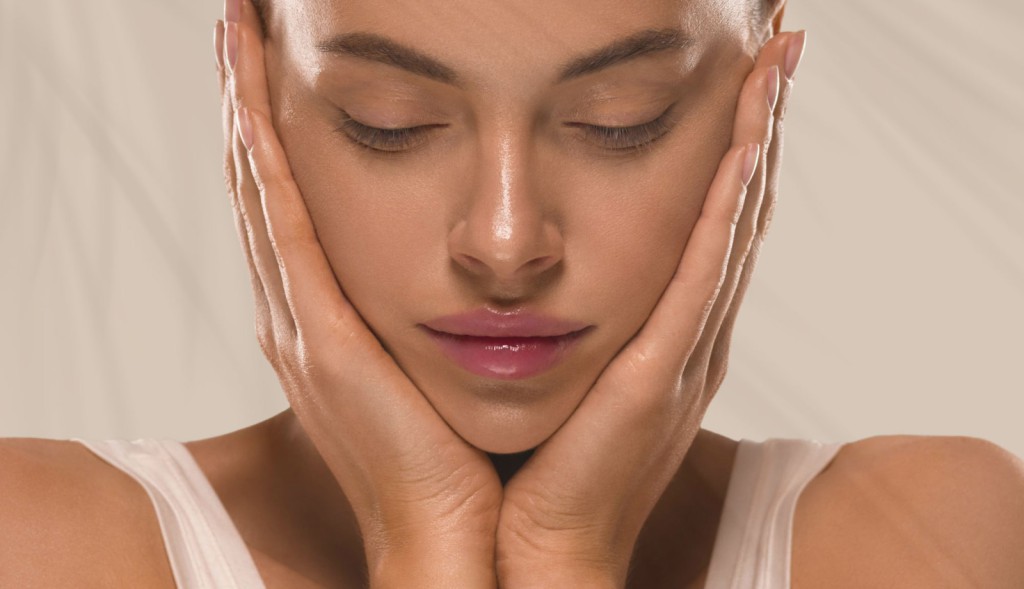 Close-up of a woman's face highlighting Botox for wrinkle reduction, skincare for improved skin health, dermal fillers for volume and contour enhancement, and laser hair removal for permanent hair reduction.